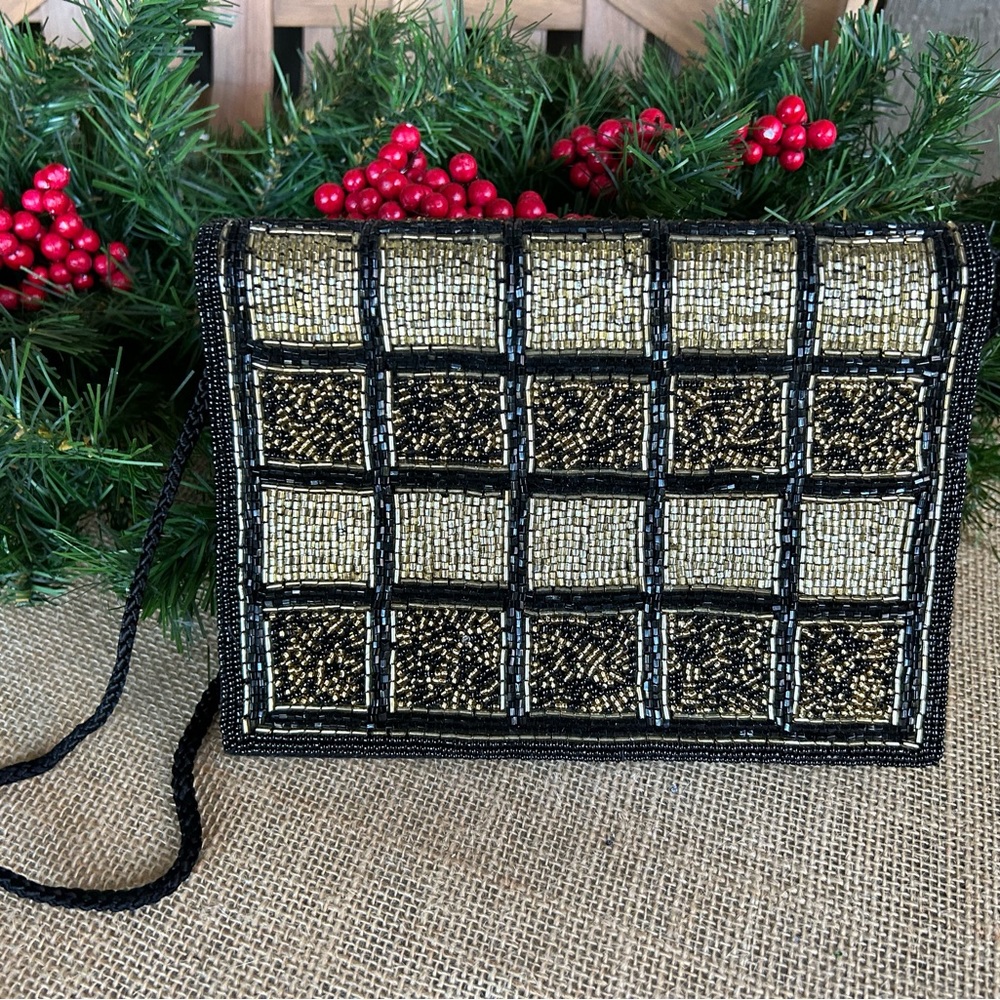 Black and gold vintage beaded front purse with cross over strap